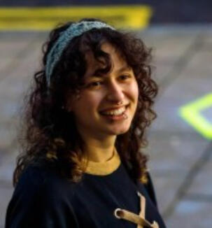 Nas Georgiou (they/them)